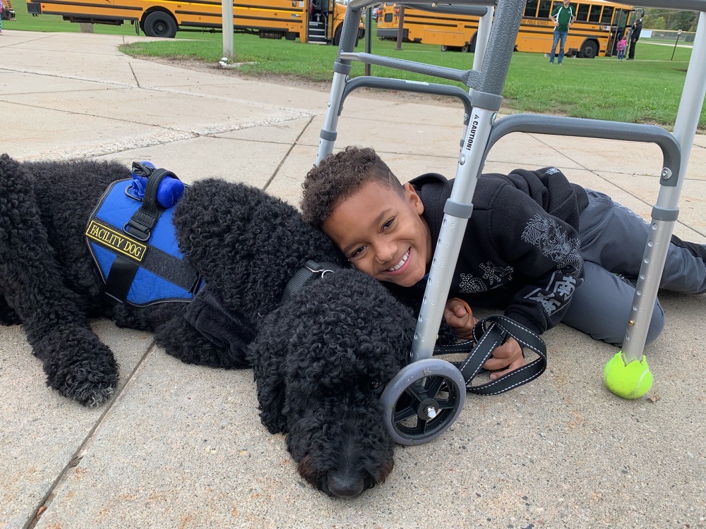Our facility dogs love their students!